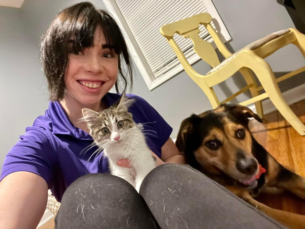 A newly adopted pet with their family