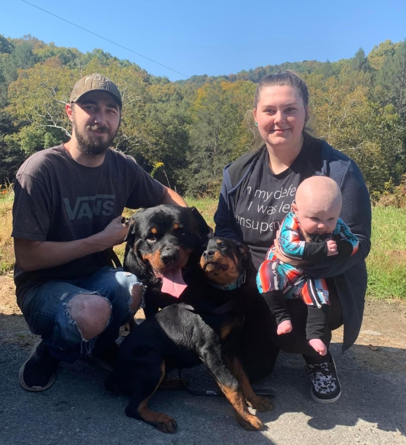 A newly adopted pet with their family