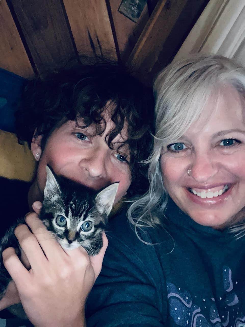 A newly adopted pet with their family