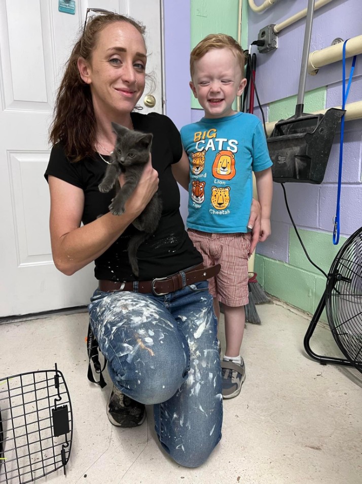 A newly adopted pet with their family