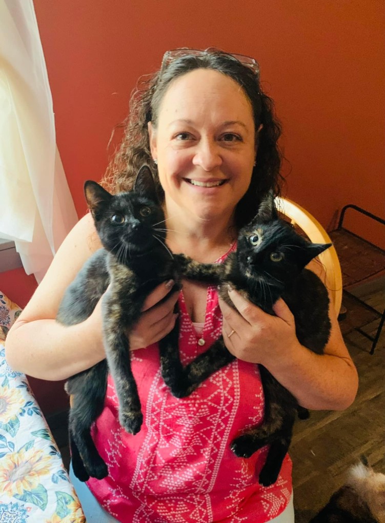 A newly adopted pet with their family