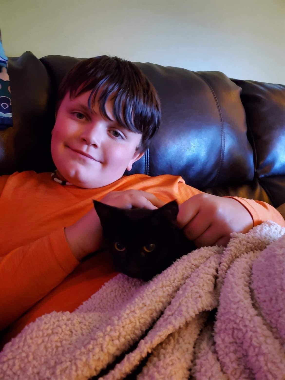 A newly adopted pet with their family