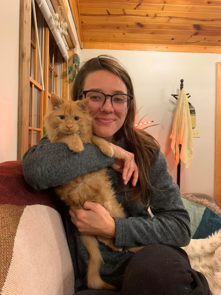 A newly adopted pet with their family