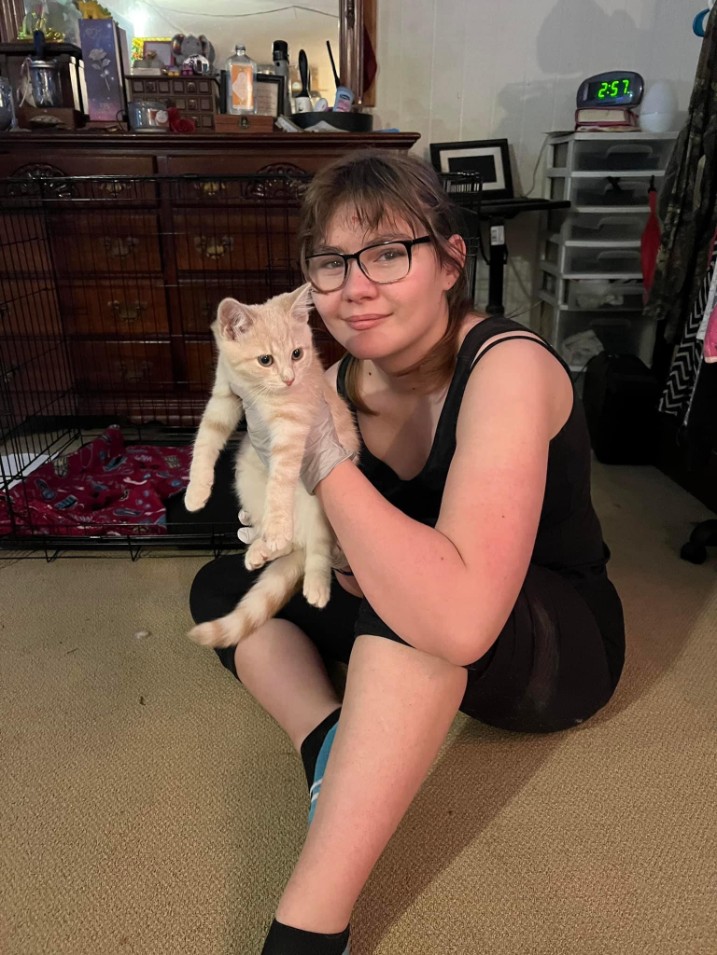 A newly adopted pet with their family