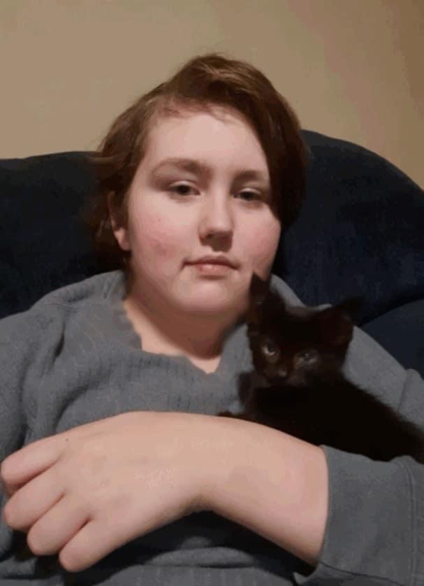 A newly adopted pet with their family
