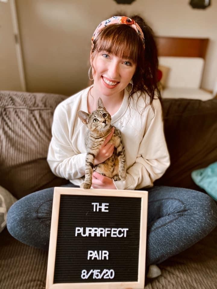 A newly adopted pet with their family