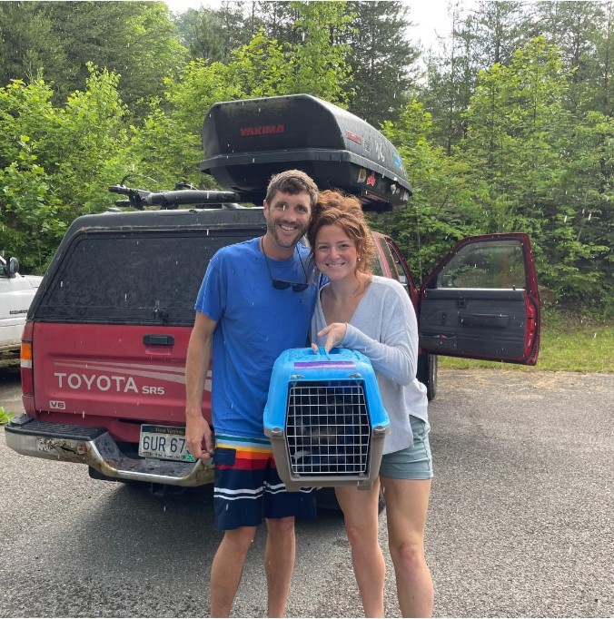 A newly adopted pet with their family