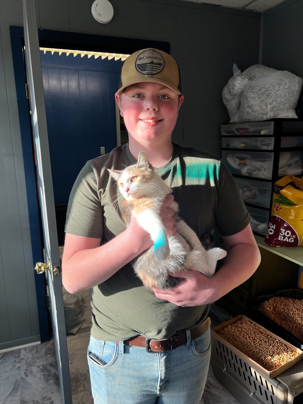 A newly adopted pet with their family