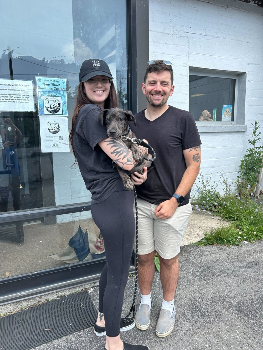 A newly adopted pet with their family