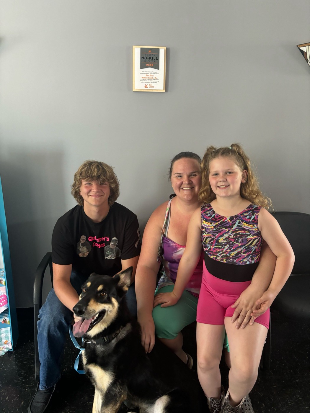 A newly adopted pet with their family