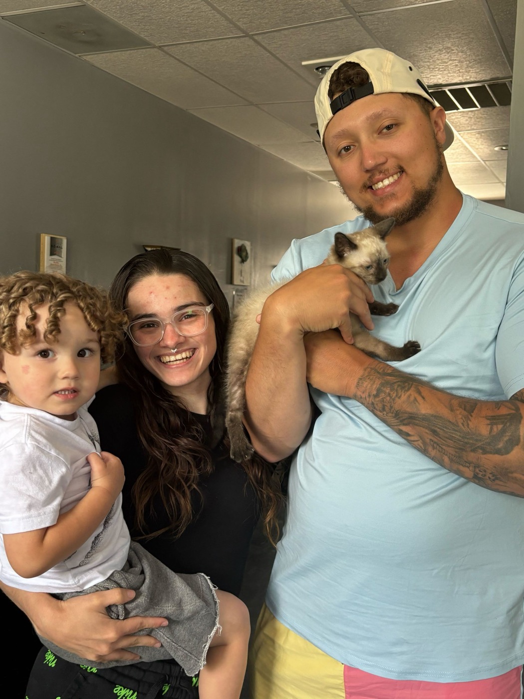 A newly adopted pet with their family