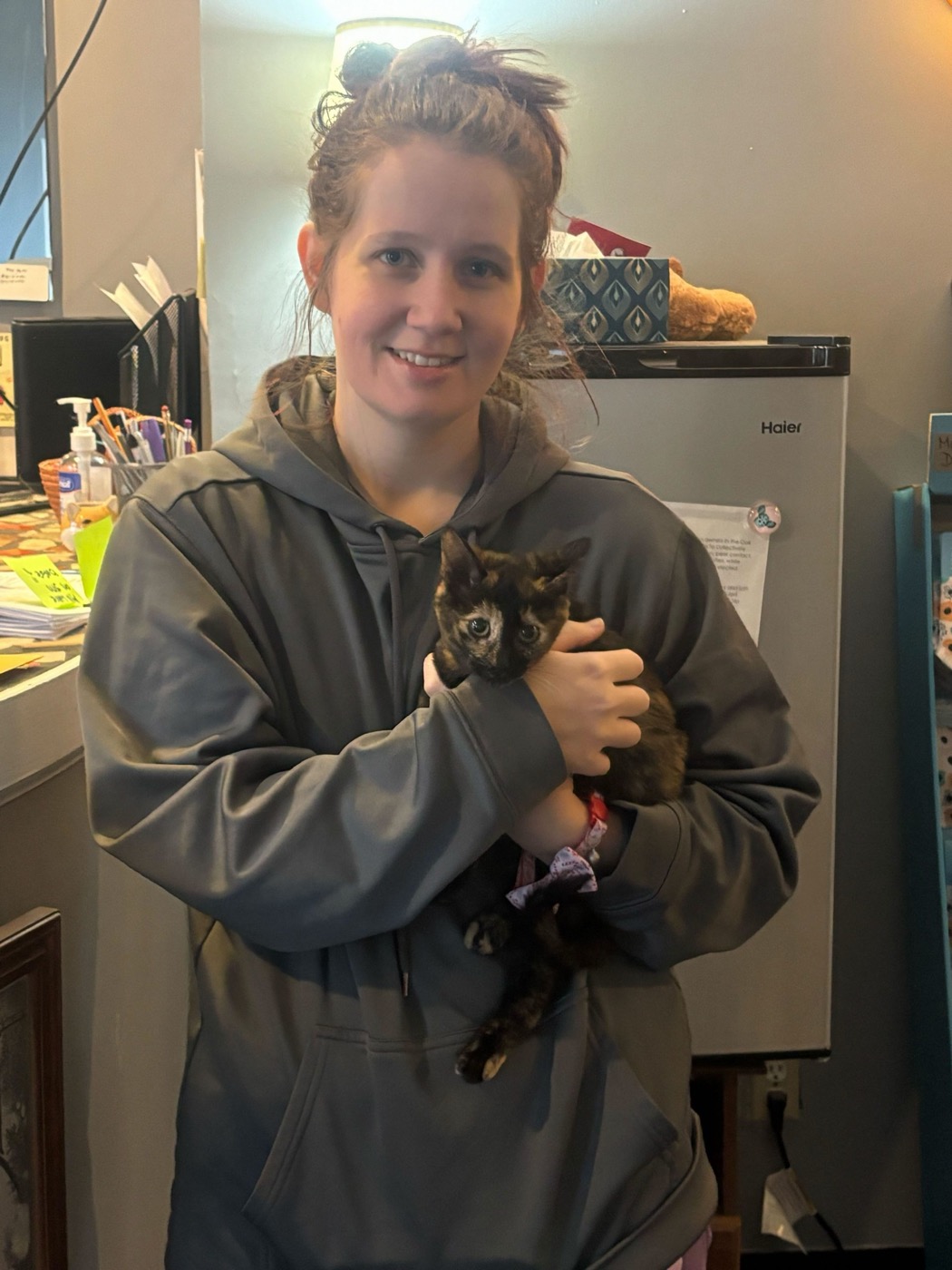 A newly adopted pet with their family
